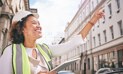 Buy stock photo Happy woman, architect and tablet pointing in city for construction, building or outdoor planning on site. Female person, engineer or contractor smile and technology for industrial urban architecture