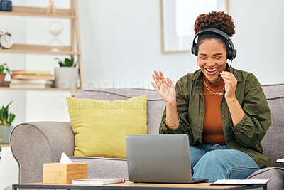 Buy stock photo Video call, wave and woman on sofa with laptop, headphones and smile in living room home office. Hello, webinar and online meeting with happy virtual assistant on couch for freelance remote work job.