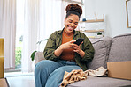 Online shopping, delivery and black woman with phone on sofa happy with package or product at home. Ecommerce, smile and African lady with smartphone for customer experience, survey or app in house
