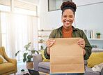 Fast food, delivery and portrait of happy black woman with package order in her home, Smile, face and African lady customer with deliver bag from online shopping, ecommerce or satisfaction in house