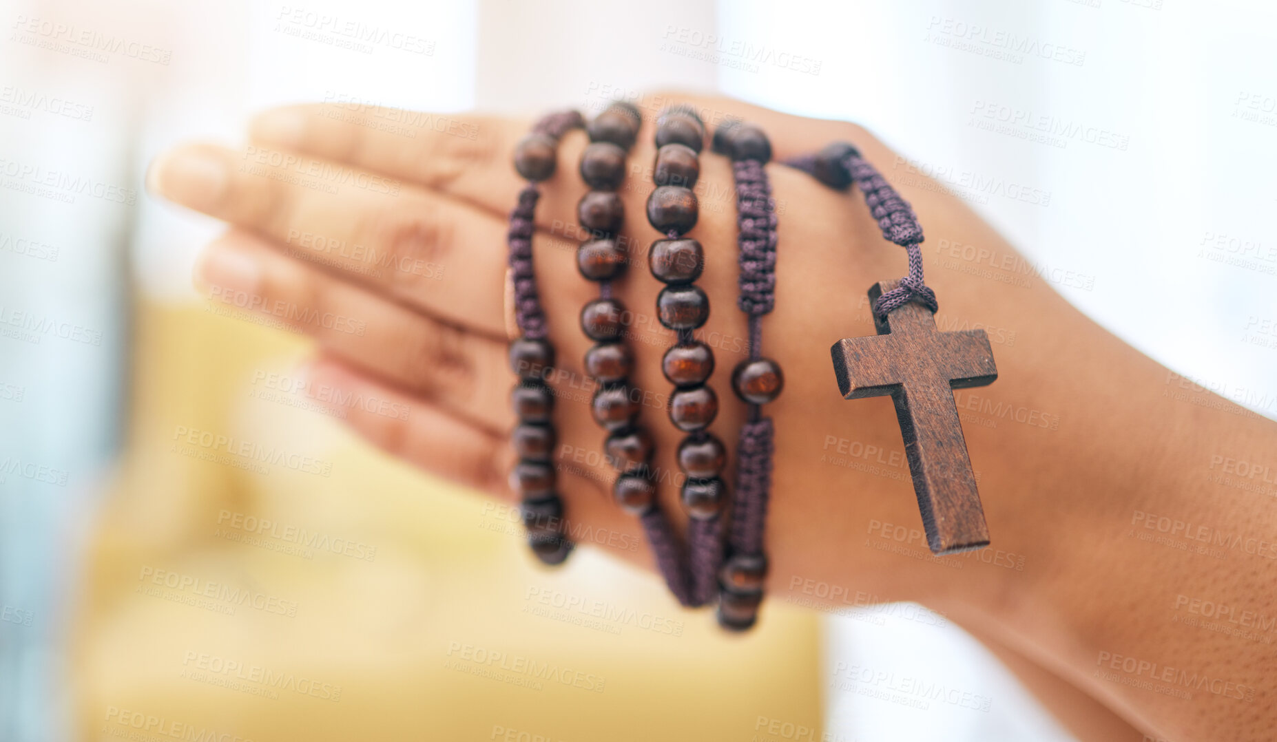 Buy stock photo Rosary, praying and hands of woman with gratitude, faith or guidance in her home for help from Jesus christ. Christian, worship and female in prayer with trust, hope and spiritual praise or blessing