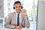 Happy man, portrait and call center with headphones in customer service, support or telemarketing at office. Male person, consultant or agent smile for online advice, help or contact us at workplace