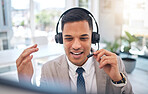 Happy man, call center and consulting on headphones in customer service, support or telemarketing at office. Male person, consultant or agent talking in online advice, help or contact us at workplace