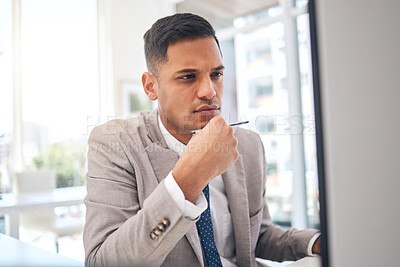 Buy stock photo Thinking, business man and planning at computer for research analysis, reading data information and problem solving. Male employee focus at desktop for website solution, decision and choice of ideas