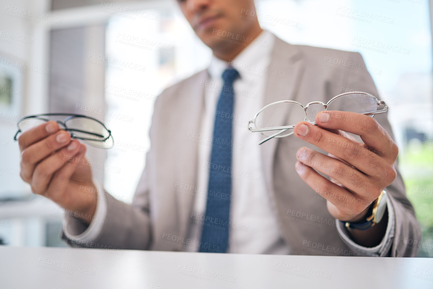 Buy stock photo Optometry, choice and closeup of a man with glasses for eye care, optical wellness or health. Vision, healthcare and zoom of a male person choosing frame for prescription spectacles or lens in store.