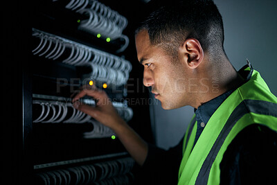 Buy stock photo Technician man, server room and inspection for cables, thinking and focus for analysis, night and programming. Information technology engineer, maintenance and database with problem solving mindset