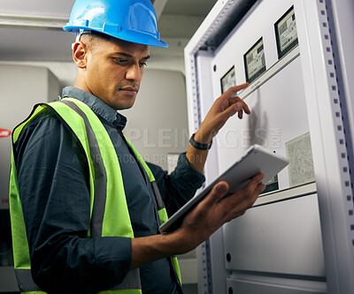 Buy stock photo Electrician, engineering and tablet with man in control room for inspection, quality assurance and energy. Electricity, safety and industrial with handyman for maintenance, technician check and power