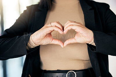 Buy stock photo Closeup of a businesswoman with a heart shape in the office  for care, support and valentines day. Zoom of a professional female person with a love hand gesture, sign or emoji in the workplace.