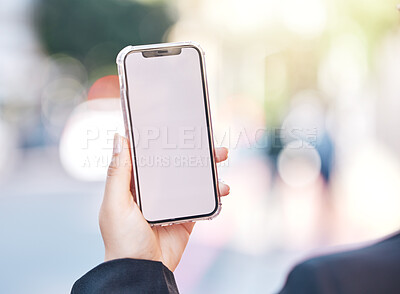 Buy stock photo Woman, hands and phone with mockup screen in city for advertising, social media or outdoor communication. Closeup of female person or mobile smartphone display for online app or network in urban town