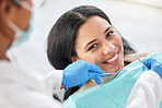 Dentist, dental care and teeth smile of a woman with tools and hands of a professional by mouth. Portrait of a female patient for orthodontics, healthcare and cleaning or inspection for oral health