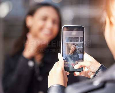 Buy stock photo Woman, phone screen and photographer with smile, city and excited for video, post or update for social media. Influencer girl, friends and smartphone for thumbs up, live streaming or profile picture