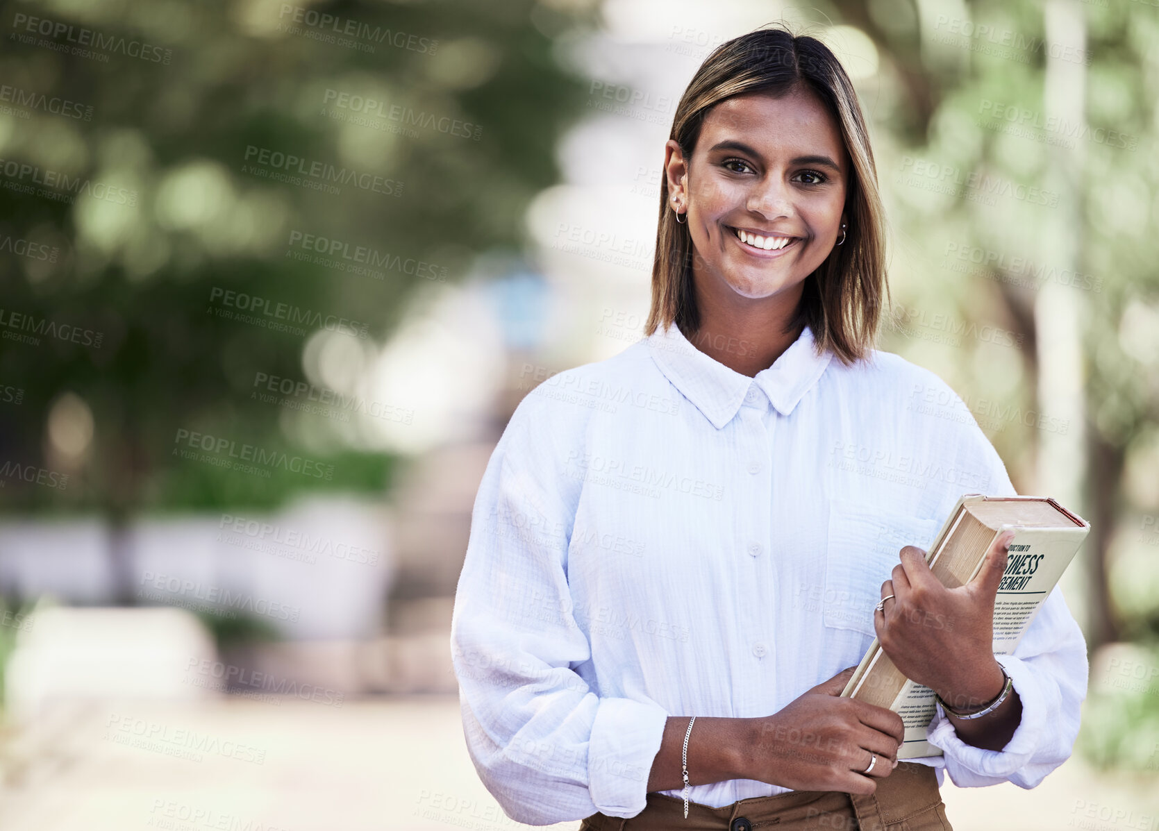 Buy stock photo Student, smile and book with portrait of woman on campus for college, studying and education. University, learning and future with female person in outdoor for academy, back to school and class