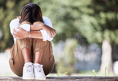 Buy stock photo Sad, cry and student with woman in park for depression, frustrated and stress. Mental health, anxiety and fear with female person in nature for psychology, tired and fatigue with mockup space