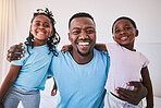 Portrait, father and children with a black family in the bedroom together for morning fun or bonding. Smile, love and kids at home with their happy male parent on a bed to relax for the weekend
