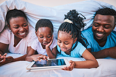 Buy stock photo Happy, black family and tablet in bed for cartoon, learning or streaming a movie together. Education, relax and children with African parents and technology for games, internet or an app in a house