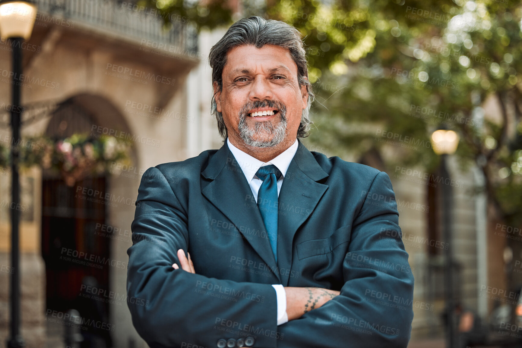 Buy stock photo Senior man, executive with arms crossed and smile in portrait outdoor, career success and pride in business. Professional mindset, male CEO and confidence, happy in city with company vision and goals