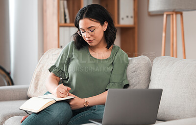 Buy stock photo Woman, student and laptop, writing in notebook and planning schedule, work from home or online education on sofa. Person with journal ideas or studying in college or university e learning on computer
