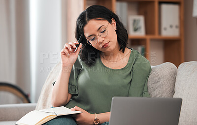 Buy stock photo Woman, student and laptop, notebook and thinking or studying and planning schedule for work from home. Person with journal ideas for online education, e learning and knowledge on sofa and computer