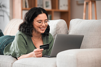 Buy stock photo Credit card, laptop and woman for home online shopping, e learning and fintech payment on sofa. Relax, student loan and person on internet banking, study subscription or website transaction on couch