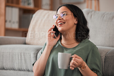 Buy stock photo Woman, coffee and phone call in living room for communication, contact or conversation. Happy person, drinking tea or talking on smartphone for networking, chat connection or mobile tech at home