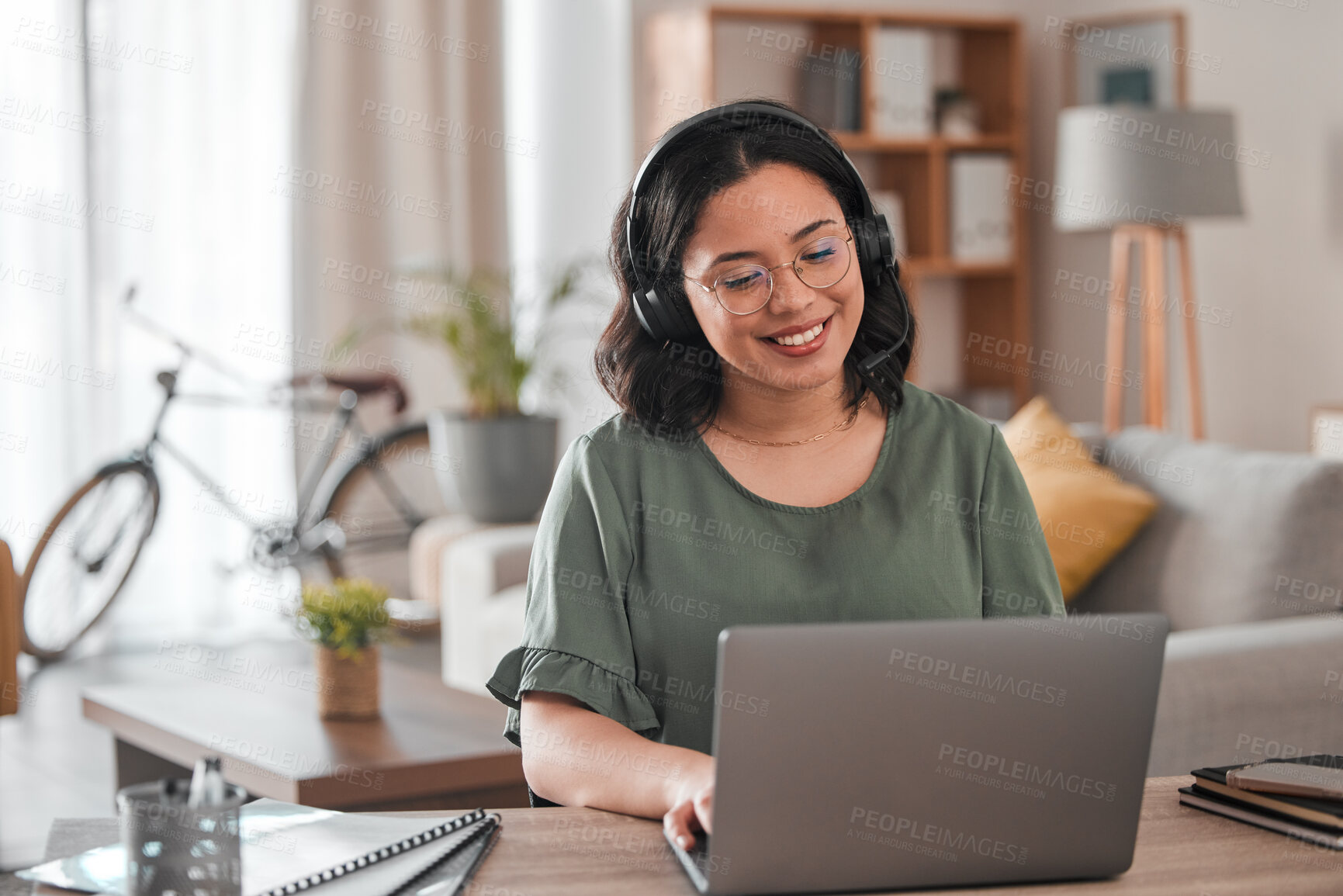 Buy stock photo Consulting, remote work and woman with laptop for call center communication and consultation. Smile, advice and young female customer service agent typing on a computer from a house for telemarketing