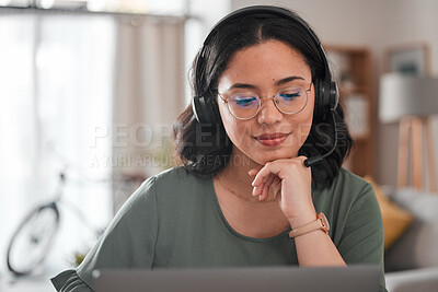 Buy stock photo Woman, remote work and virtual assistant with headphones at laptop for video call, voip communication and telemarketing. Female consultant, computer and microphone for customer support at home office