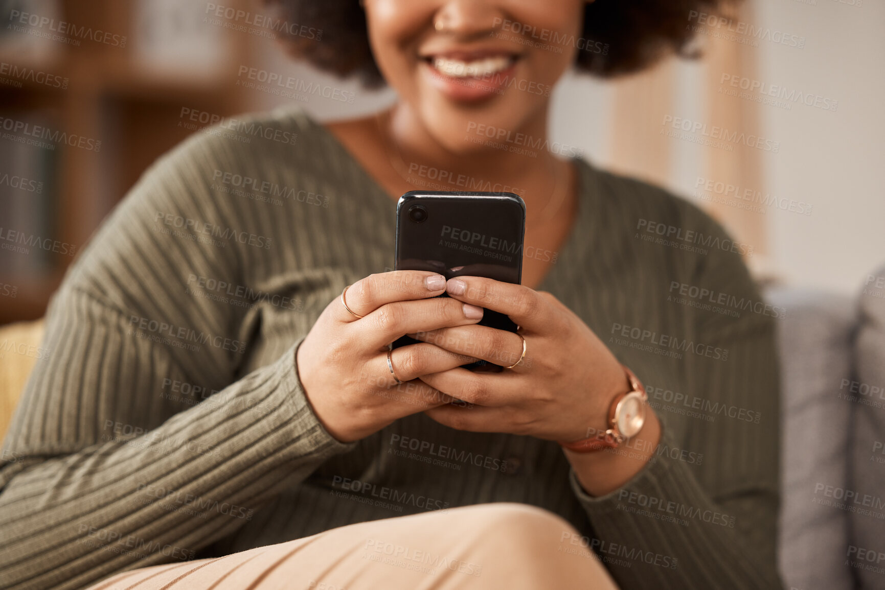 Buy stock photo Hands, woman and typing with phone in home for social media post, online chat and reading notification. Closeup of female person relax with smartphone, download mobile games or search digital network