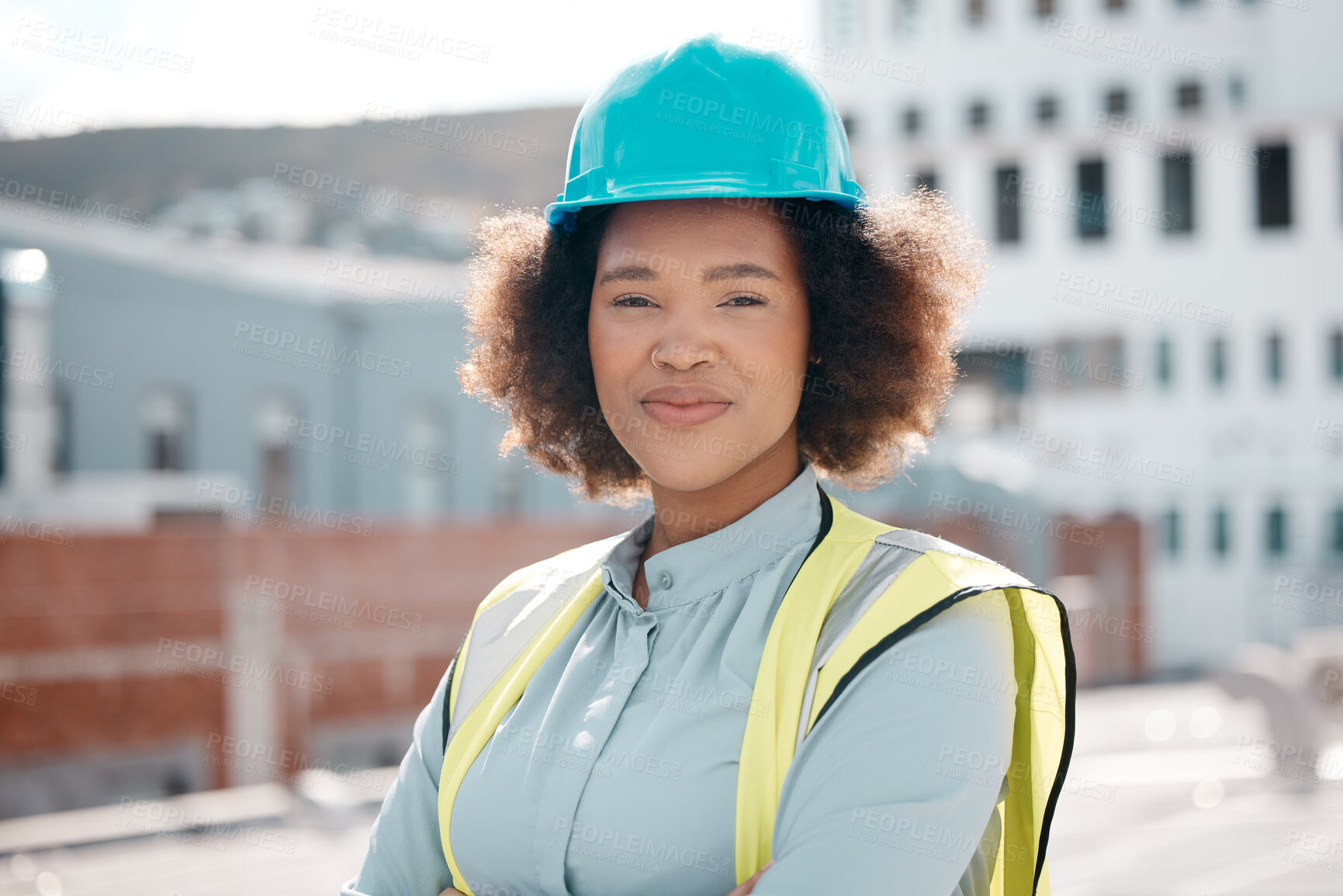 Buy stock photo Portrait, engineer and confident woman on city rooftop for career in renewable energy. Face, architect and serious developer, solar contractor with helmet and employee from South Africa outdoor