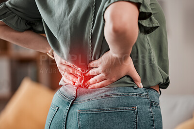 Red, back and pain of woman with injury problem, health risk or muscle inflammation at home. Closeup of uncomfortable female person with glow on spine of bad posture, backache and stress of scoliosis