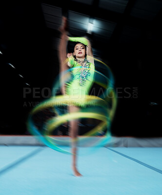 Gymnastics, sports and woman with ribbon dance for rhythmic movement, training and exercise in gym. Creative performance, aerobics and portrait of female dancer for competition, workout and dancing