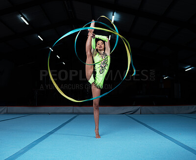 Buy stock photo Gymnastics, sports and woman with ribbon in gym for rhythmic body movement, training or exercise. Aerobics performance, health and portrait of female dancer for competition, workout or dance practice