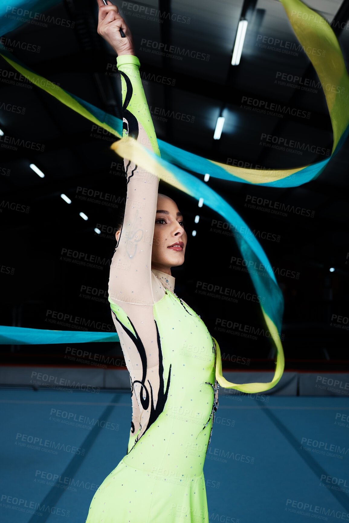 Buy stock photo Ribbon, dance and rhythmic gymnastics, woman in gym with action and performance for fitness. Competition, athlete and female gymnast, dancer with creativity and art, routine and energy at arena