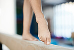 Gymnastics, woman feet and balance beam with fitness and exercise for performance. Gym, sports and female person and training of a gymnast and athlete with workout and challenge with point and steps