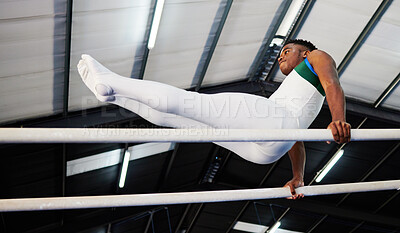 Buy stock photo Strength, fitness and gymnast or male athlete with practicing  for competition with african at gym. Gymnastics, sports and man with balance on beam for training with healthy body at arena or club.