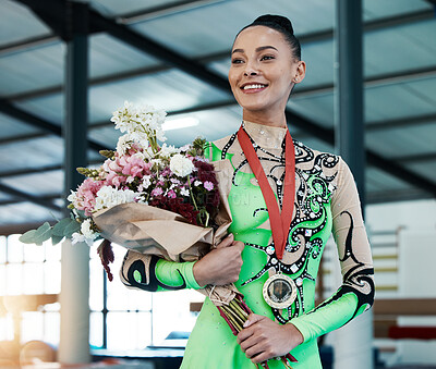 Buy stock photo Woman, gymnastics and winner, medal and flower bouquet, happy with celebration and winning competition. Prize, reward and bonus, female champion on podium with gymnast and athlete smile with gift