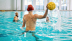 Water polo, ball and people in swimming pool training, exercise and fitness game or sports event. Professional swimmer, man and team for shooting competition, athlete challenge and workout in splash