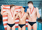 Winner, gold medal and the usa water polo team in celebration of success at a sports event in a gym. Fitness, victory and american flag with happy athletes cheering together in triumph on a podium