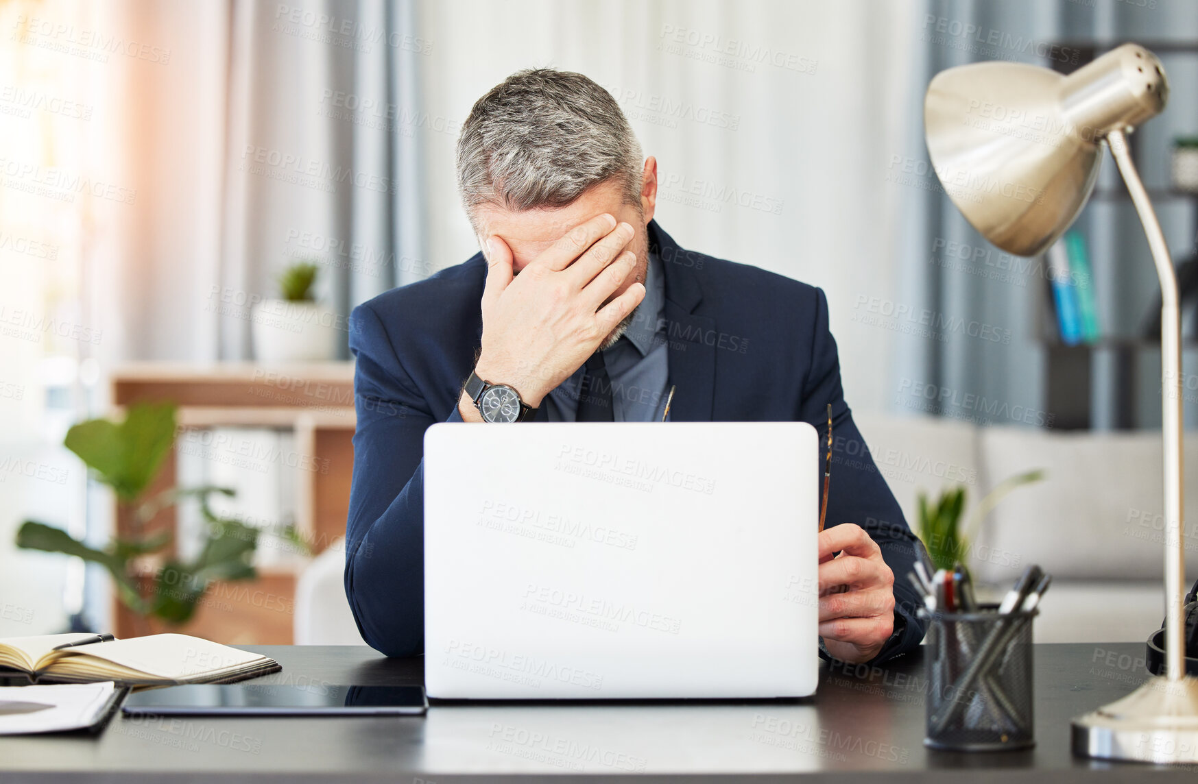 Buy stock photo Business man, headache and laptop with stress, report and pain at desk, mental health and financial agency. Mature CEO, boss or leader with computer, emergency and burnout with anxiety for 404 glitch