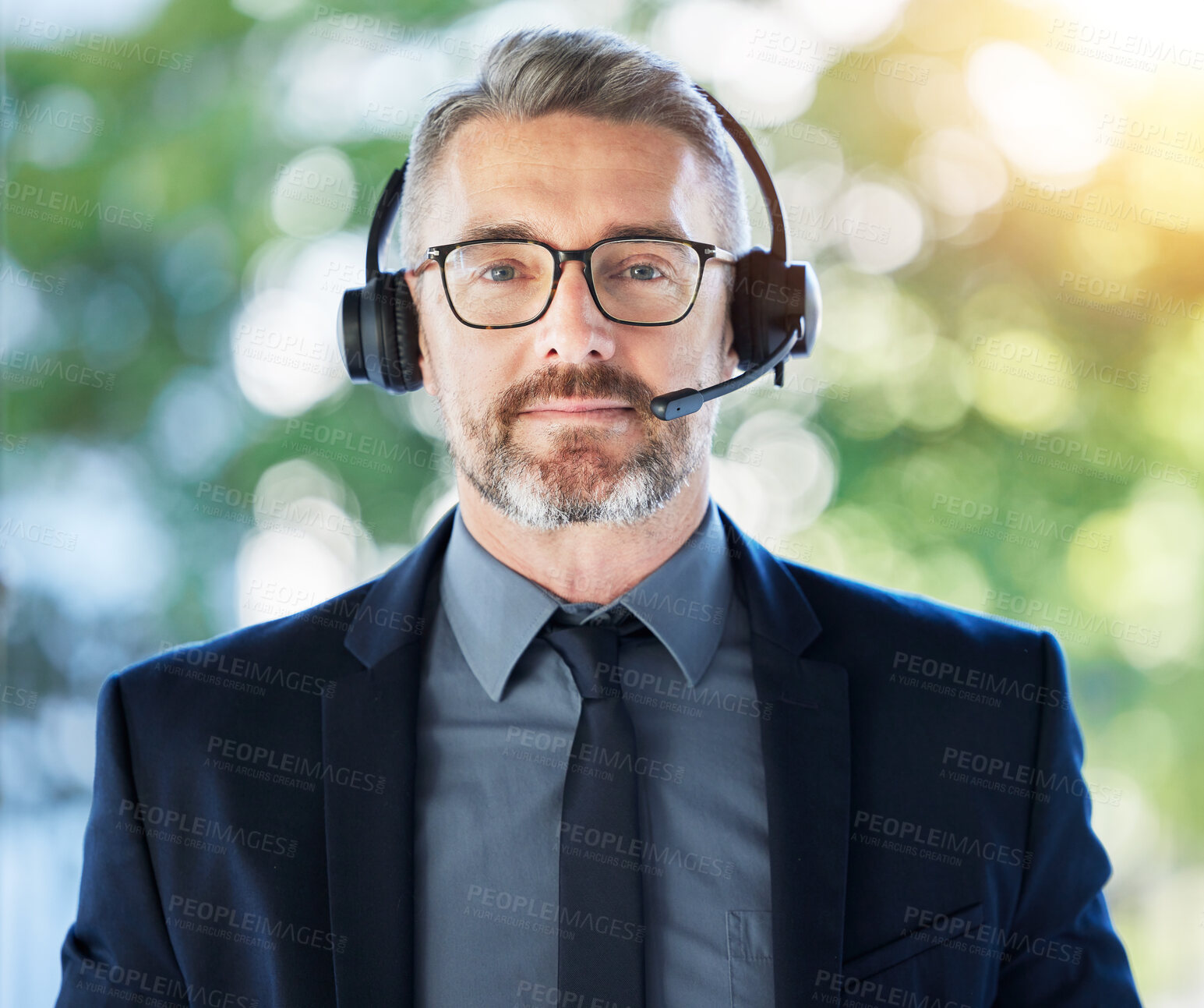 Buy stock photo Call center, portrait and senior man with headset, CRM and contact us with communication and professional headshot. Telecom, customer service and male consultant with help desk employee and mic