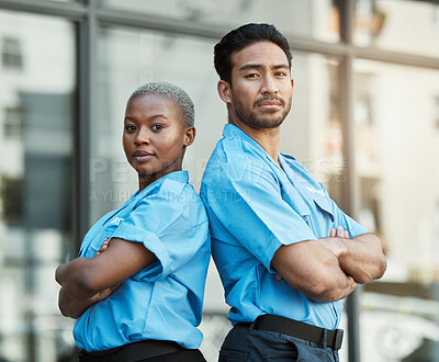 Buy stock photo People, portrait and security guard team with arms crossed in city for career safety or outdoor protection. Serious man and woman police officer in confidence, law enforcement or patrol in urban town