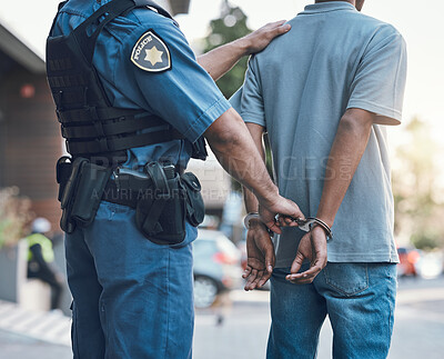 Buy stock photo Stop, handcuffs and hands of police man with criminal in city for justice, crime or corruption. Illegal, arrest and law enforcement officer with suspect, thief or gangster for jail, robbery or fail