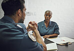 People, police and team in meeting for crime report, documents or case discussion at the precinct. Man and woman, law enforcement or officers working together on investigation or paperwork at station