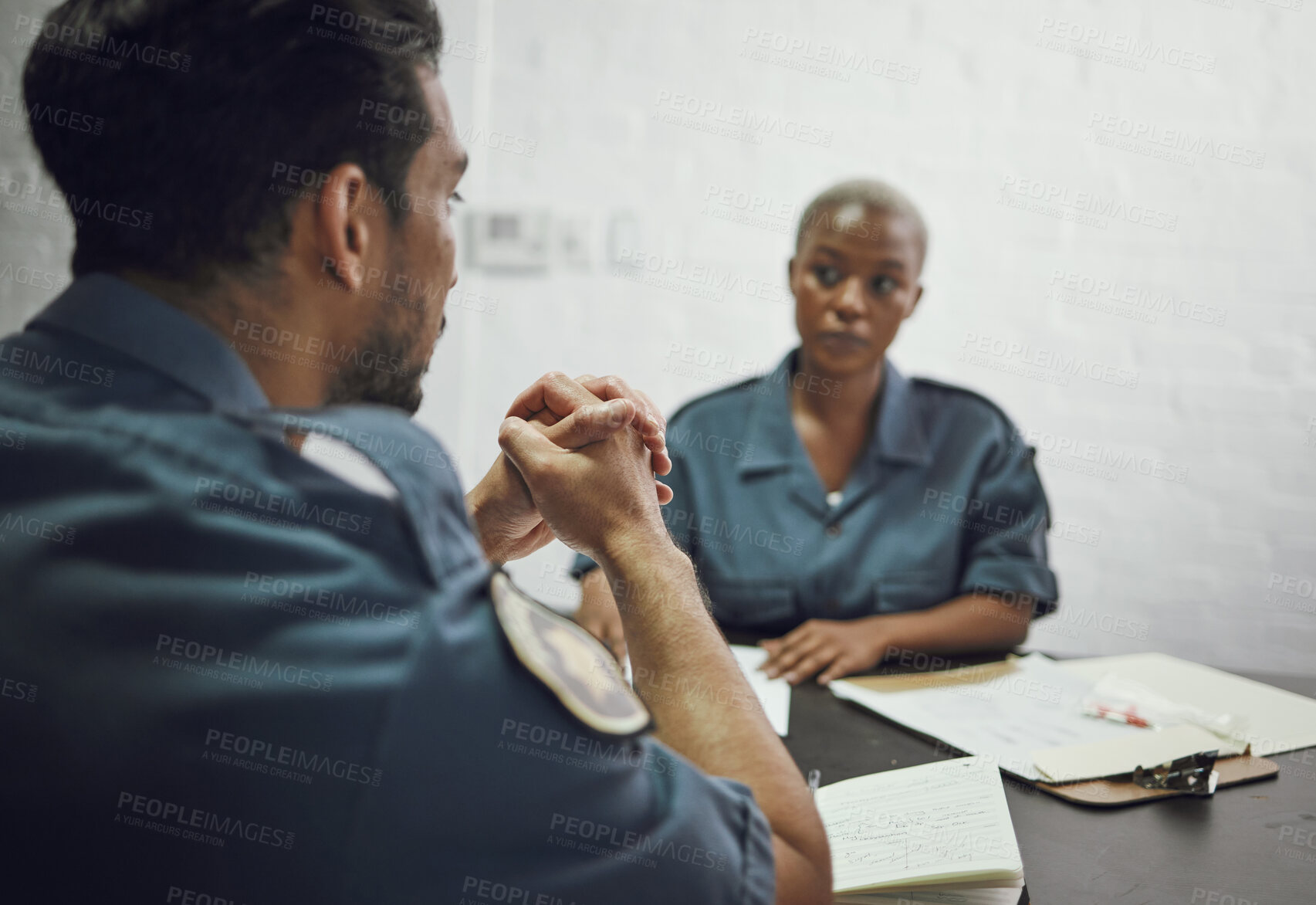 Buy stock photo People, police and team in meeting for crime report, documents or case discussion at the precinct. Man and woman, law enforcement or officers working together on investigation or paperwork at station