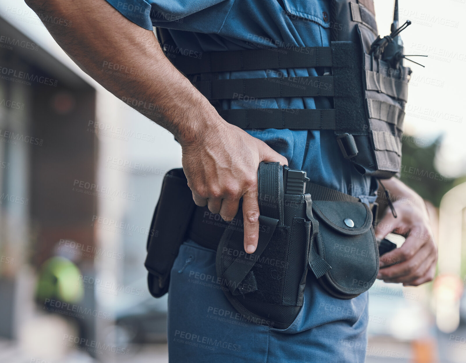 Buy stock photo Security, police and hands of man with gun in city for shift, inspection and supervision on patrol. Weapon, law enforcement and closeup of male person in town for safety, crime and protection service