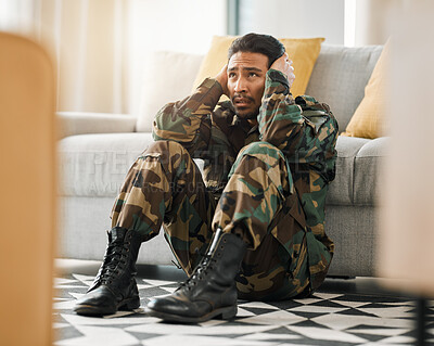 Buy stock photo Soldier, depression and ptsd with man in living room for anxiety, stress and psychology. Army, military and war veteran with person and trauma at home for mental health, bipolar and schizophrenia