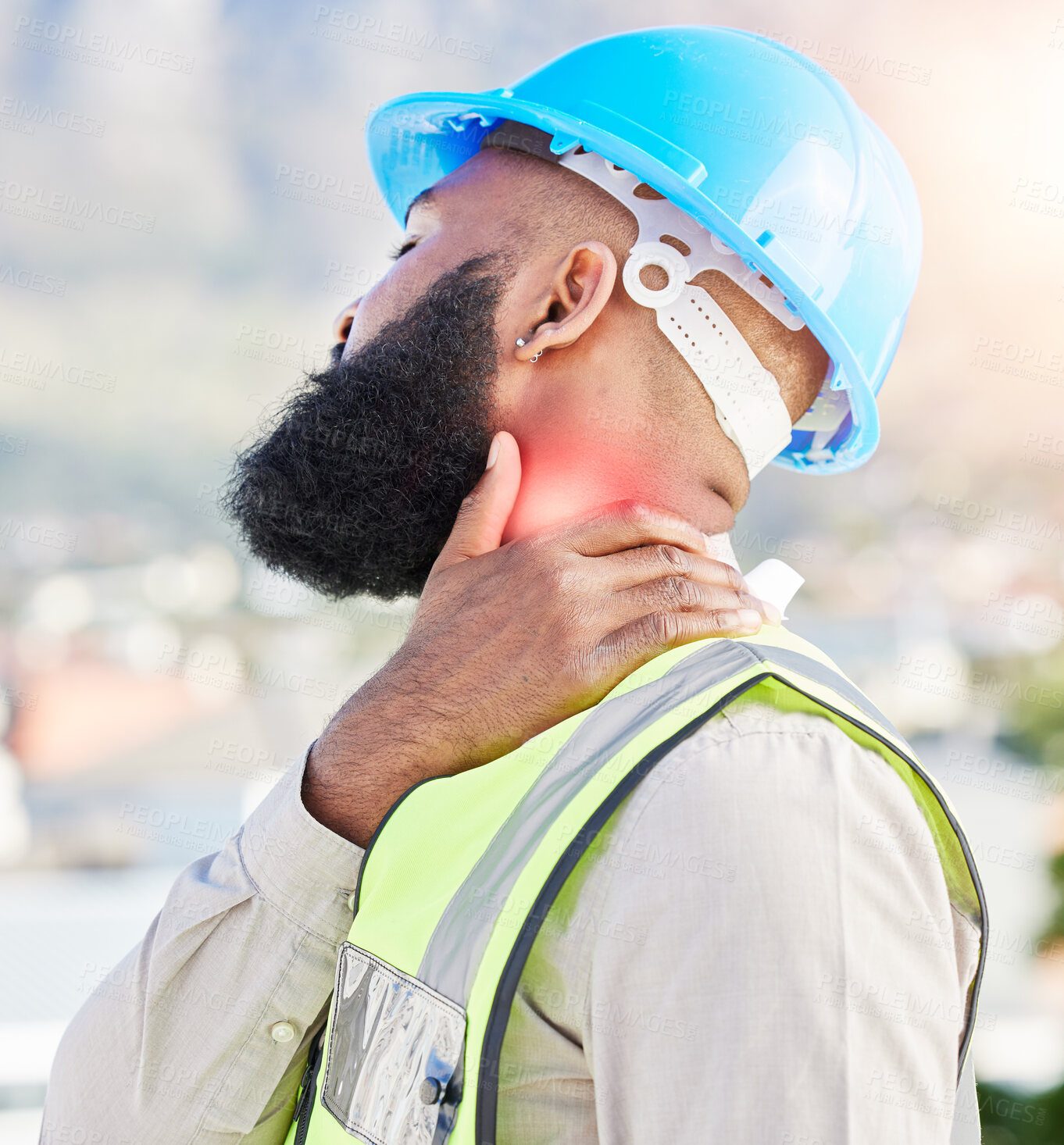 Buy stock photo Black man, architect and neck pain in city from injury, accident or muscle tension on rooftop. Frustrated African male person with sore bone, ache or joint inflammation during construction on site