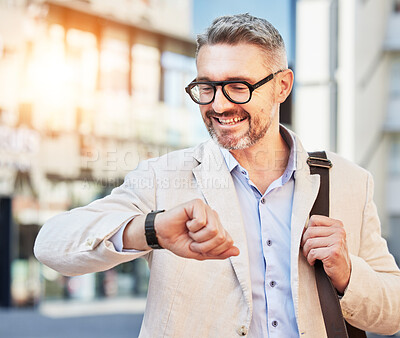 Buy stock photo City, mature businessman and checking time for travel, morning commute or appointment. Professional, corporate and an employee or manager with a watch to be early or late for work with a smile