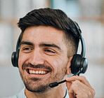 Telemarketing, consulting and face of man in call center for customer service, lead generation or CRM offer. Happy salesman, consultant or contact on microphone for telecom, advisory or FAQ questions