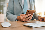 Business man, hands and phone app at desk with networking, text and online communication. Computer, mobile message and social media browse in a office and workplace with contact and typing at company