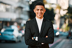 Crossed arms, business and portrait of happy man in city for confident, startup goals and commute. Travel, professional job and face of male entrepreneur in urban town for career, working and success